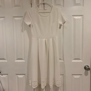 White short-sleeved knee length dress
